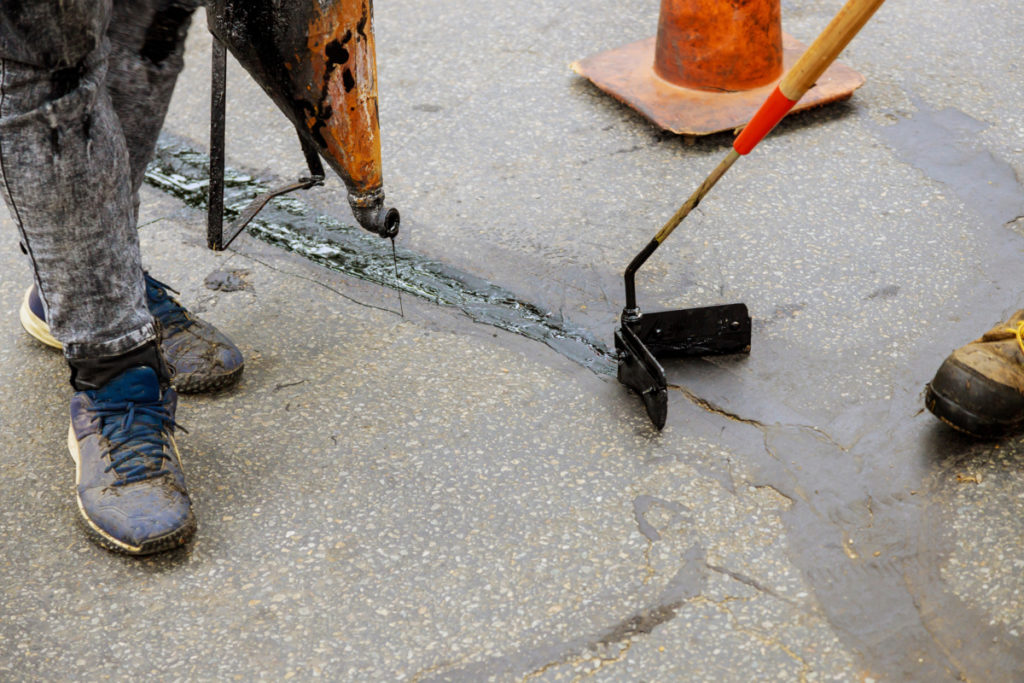 Asphalt Crack Repair: Does Store-Bought Filler Really Work?